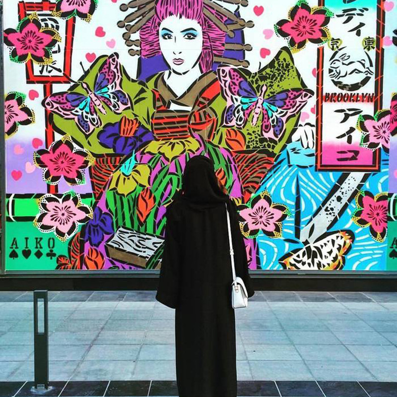 Street art, graffiti, woman, hijab, Dubai, UAE